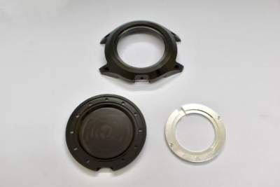CNC-machined watch case set: carrure, case back (fond), and stainless-steel movement ring (cercle) for AOS watch project 1983